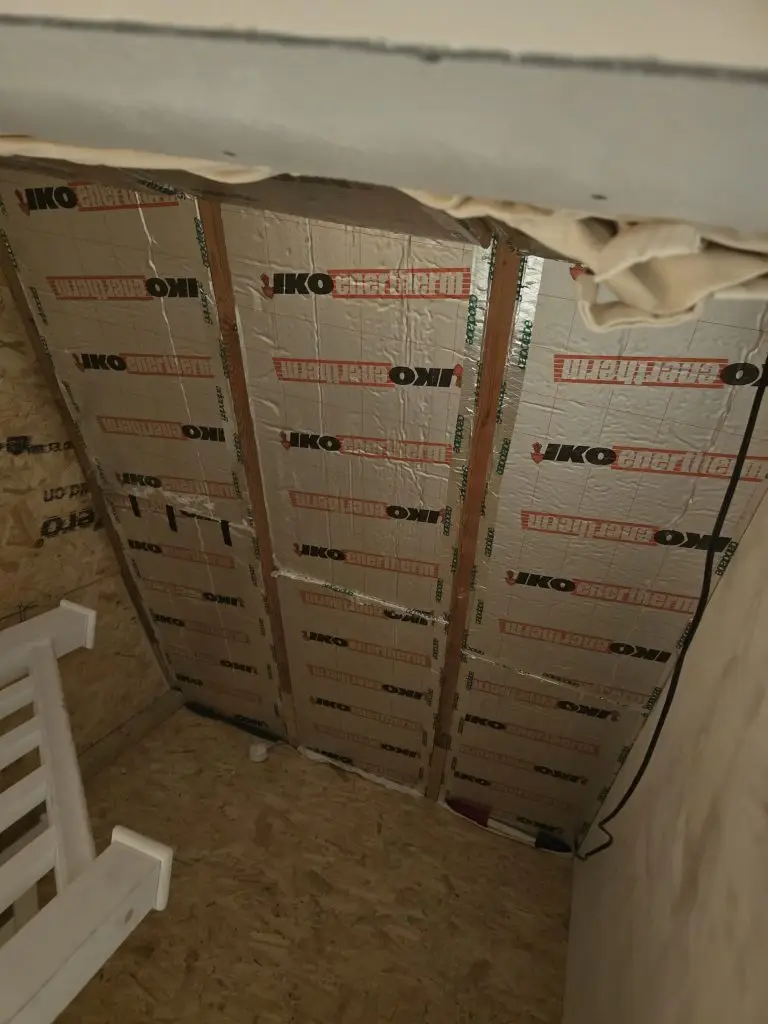IKO PIR insulation boards fitted between the rafters of a sloping roof.